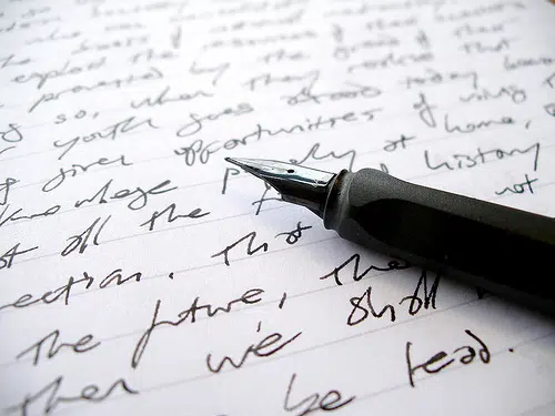 fancy pencil and open notebook